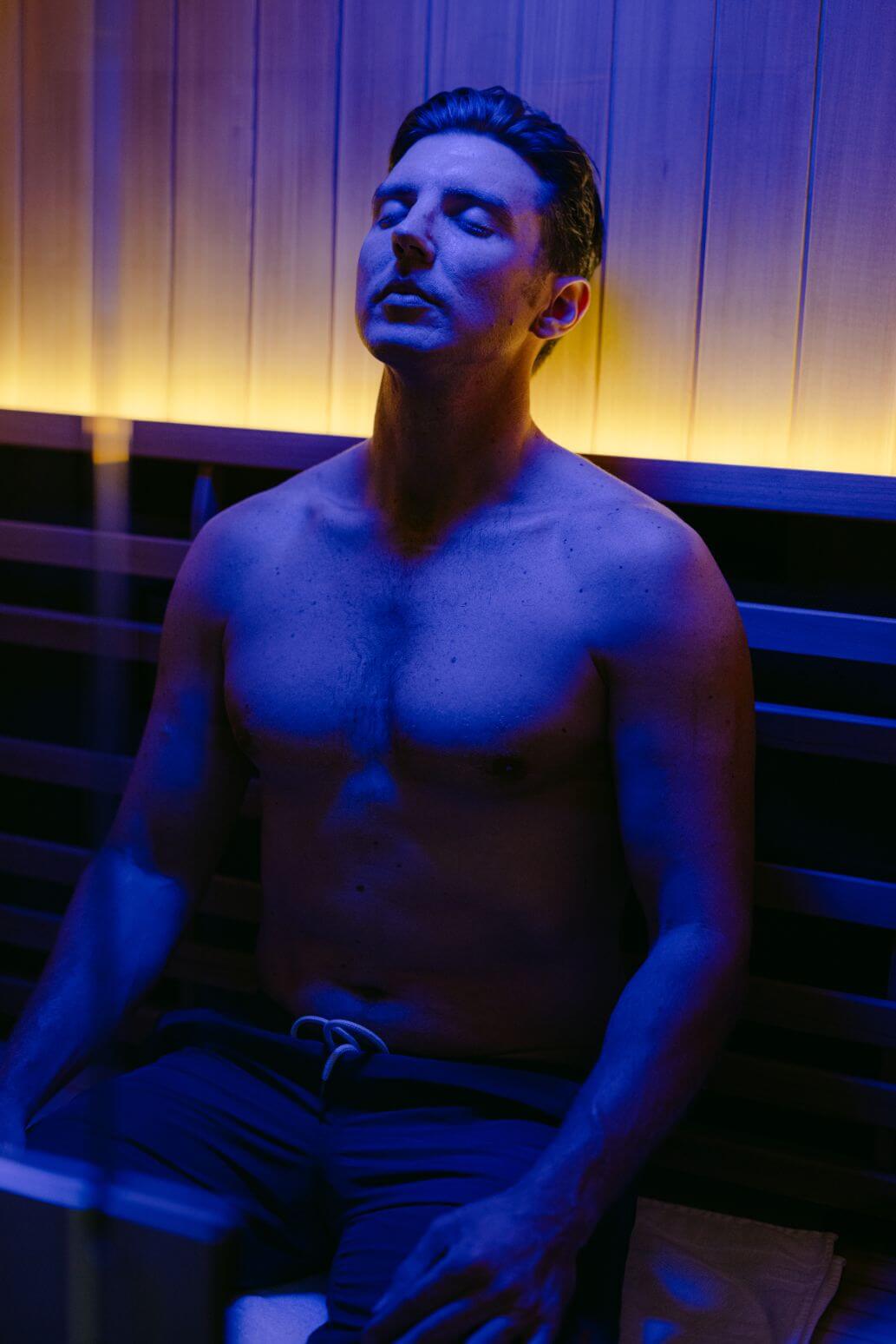 Man enjoying his infrared sauna session.