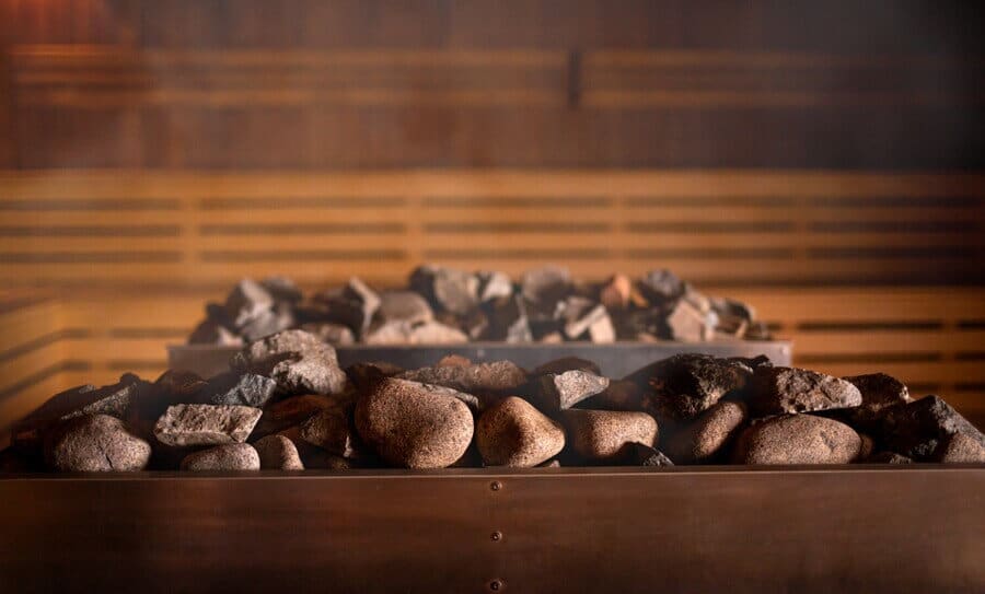 Sauna stones with sauna background.
